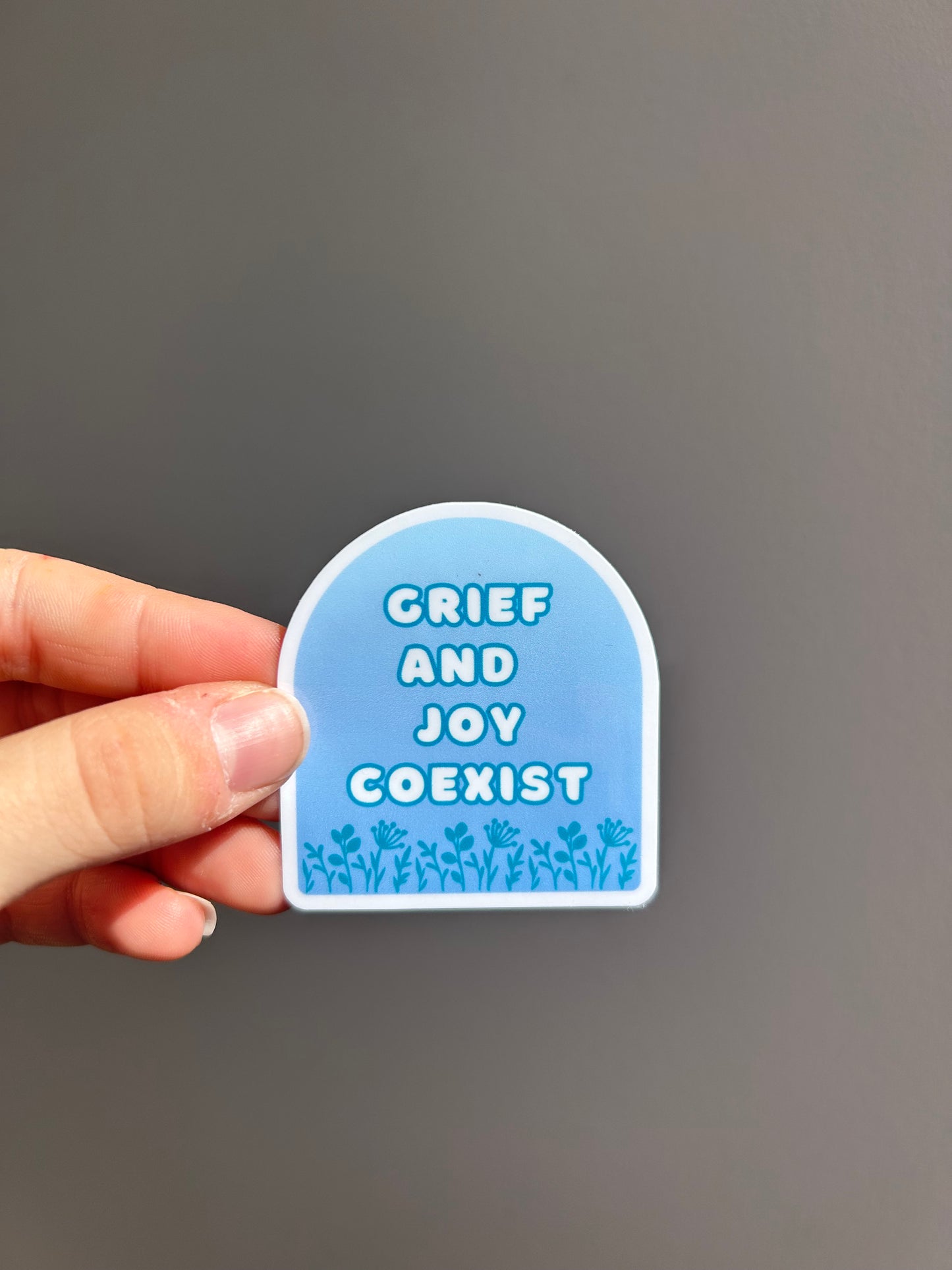 Grief and Joy Coexist Sticker